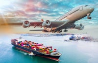 an airplane flying over a container ship in the ocean