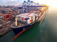 a large container ship docked at a port