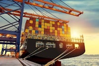 a large container ship docked at a dock